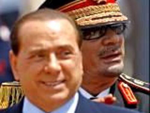 Libia, forfait di Putin e Sarkozy Il Cav da Gheddafi solo per il trattato